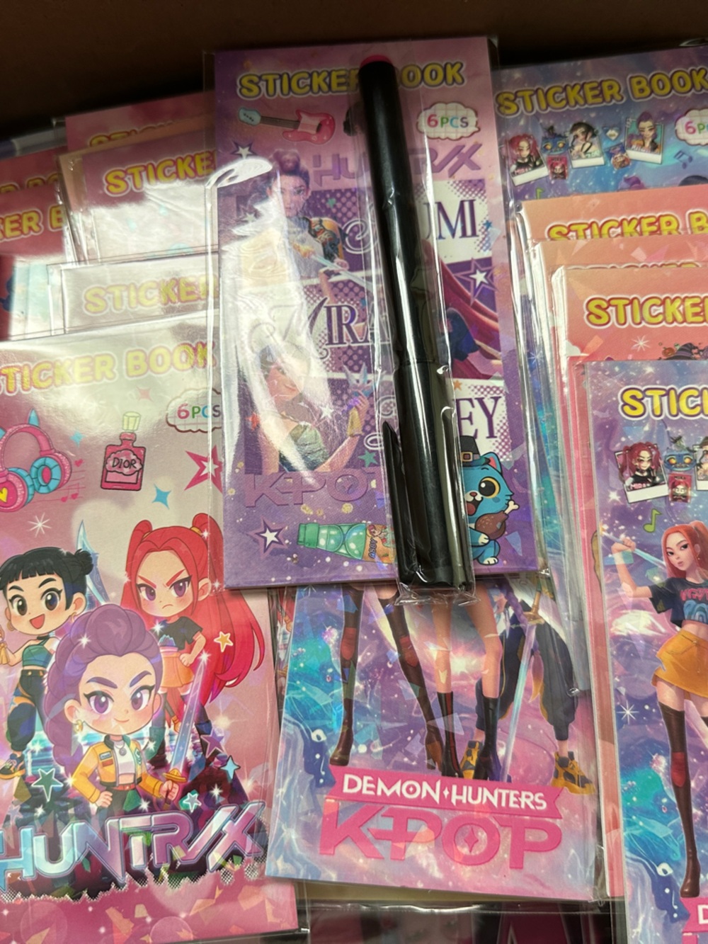 2 random booklets  Demon Hunter Huntrx K-Pop Sticker Book Party Favors